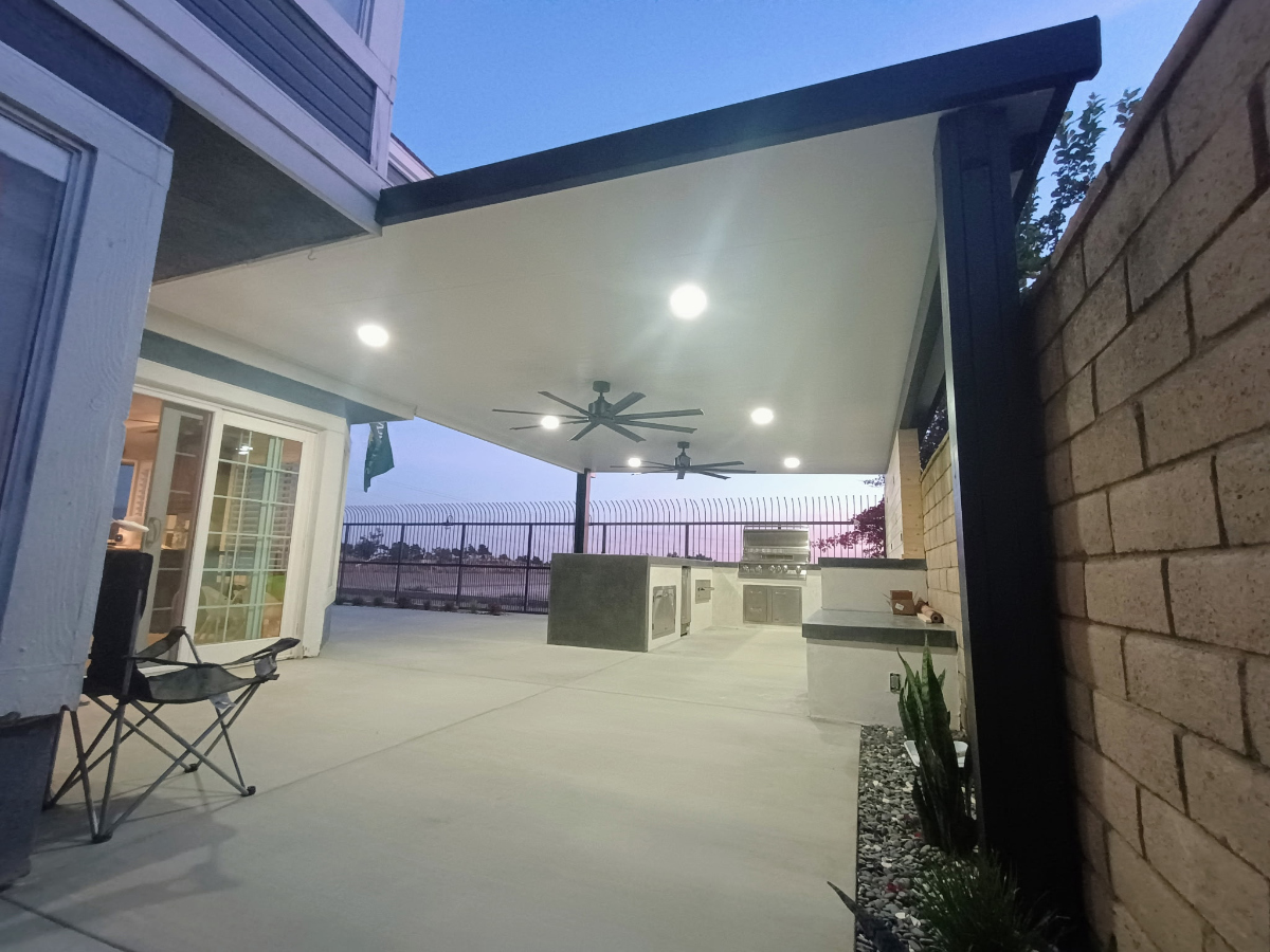 Custom aluminum patio cover with skylight panels for natural daylight